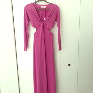 Floor length brand new magenta dress with cutouts.